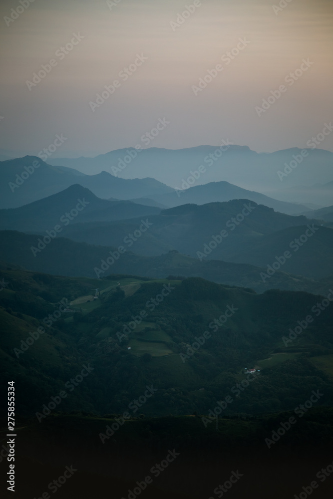 Mountain layers on a foggy evening sunset Mountain layers on a foggy evening sunset