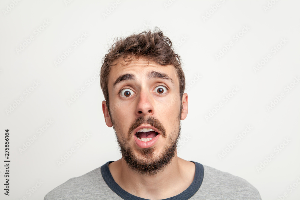 Man amazed face, close up portrait. Man amazed face, close up portrait.