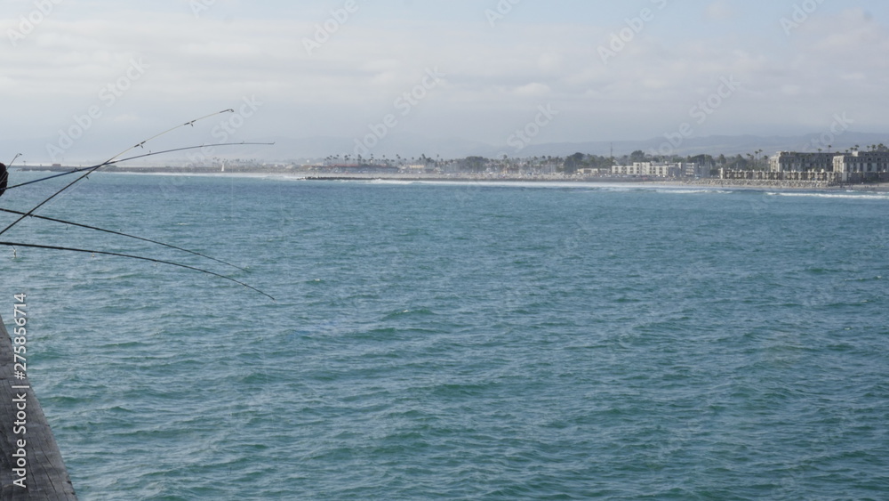 Oceanside Pier California with beach coastline and fishing rods shot in high resolution Oceanside Pier California with beach coastline and fishing rods shot in high resolution