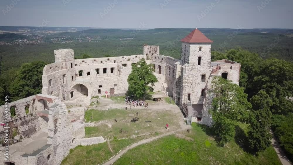 Beautiful historic castle ruins on a green hill. Ruins of Tenczyn Castle in Rudno, Poland. Beautiful historic castle ruins on a green hill. Ruins of Tenczyn Castle in Rudno, Poland.