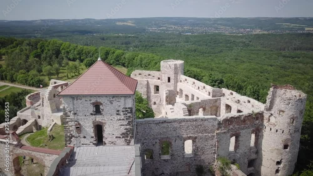 Beautiful historic castle ruins on a green hill. Ruins of Tenczyn Castle in Rudno, Poland. Beautiful historic castle ruins on a green hill. Ruins of Tenczyn Castle in Rudno, Poland.