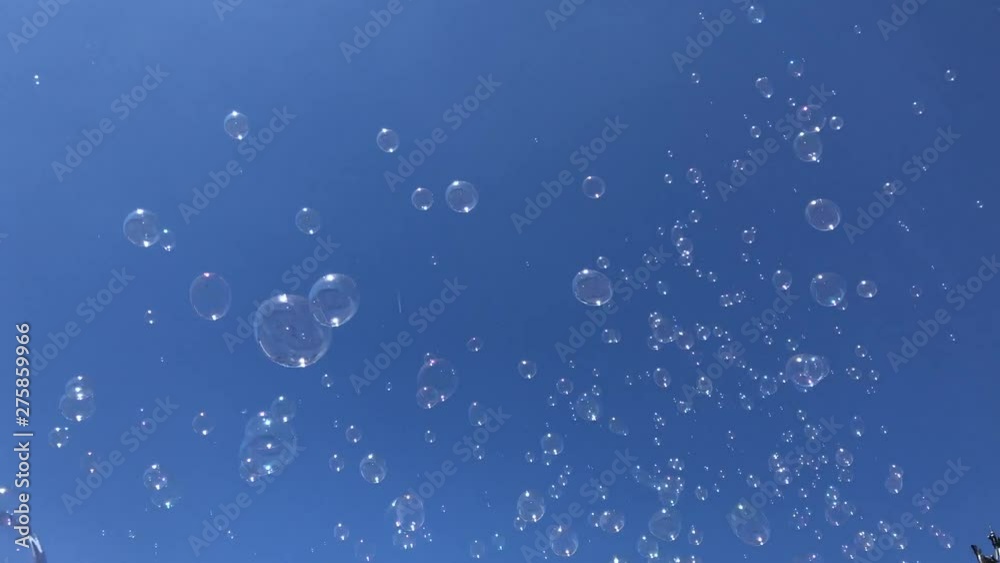The Brandenburg Gate / Brandenburger Tor and Soap bubbles on blue Sky, Berlin, Germany The Brandenburg Gate / Brandenburger Tor and Soap bubbles on blue Sky, Berlin, Germany