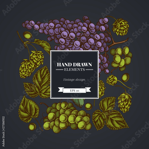 Square floral design on dark background with grapes, hop