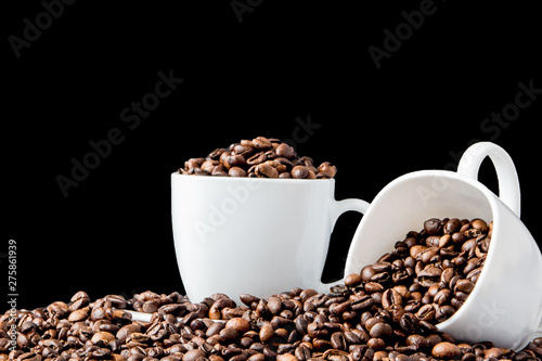 Black coffee in white cup and coffee beans on black background. Top view  space for text