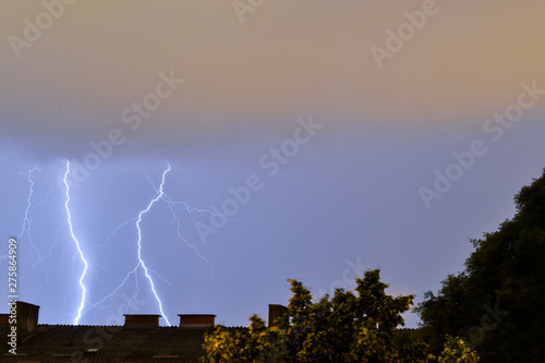 Lightning strikes behind building during storm in Croatia