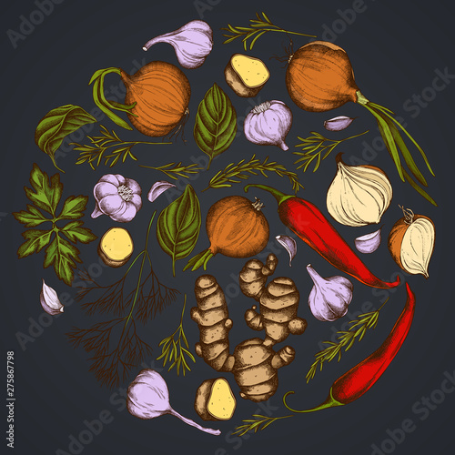 Round floral design on dark background with onion, garlic, pepper, greenery, ginger, basil, rosemary