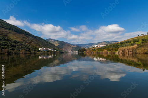 Scenic view of the Pinhao village with terraced vineyards and the Douro River and the Douro Valley  in Portugal  Concept for travel in Portugal and most beautiful places in Portugal