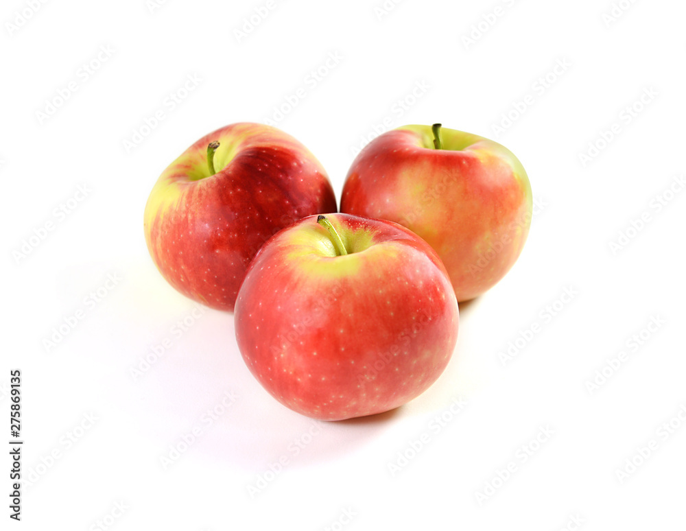 Three red apples isolated on white background. Three red apples isolated on white background.