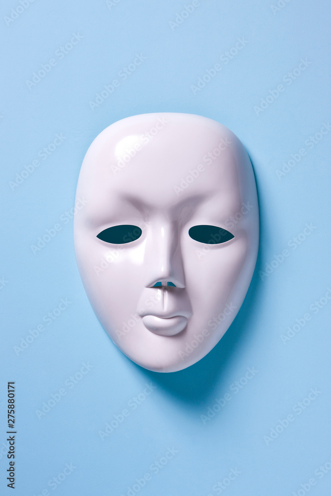 White mask and blue background White mask and blue background