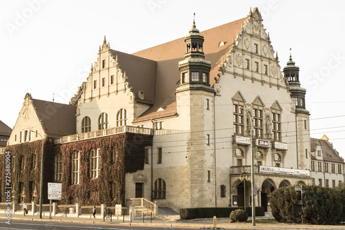 Poznan, Poland - October 12, 2018: Adam Mickiewicz university building in polish city Poznan. Aged photo
