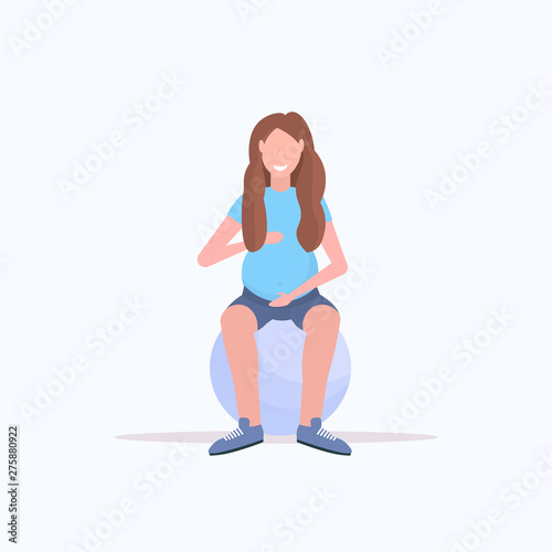pregnant woman doing exercises with gymnastic ball girl working out on fitball fitness pregnancy healthy lifestyle concept full length flat