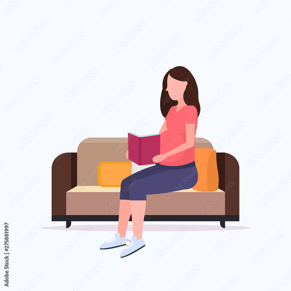 happy pregnant woman sitting on couch and reading book girl holding her bump girl pregnancy matherhood concept full length flat happy pregnant woman sitting on couch and reading book girl holding her bump girl pregnancy matherhood concept full length flat