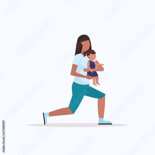 mother with kid doing squats physical exercises african american sportswoman engaged in fitness or yoga with baby daughter healthy lifestyle concept flat full length