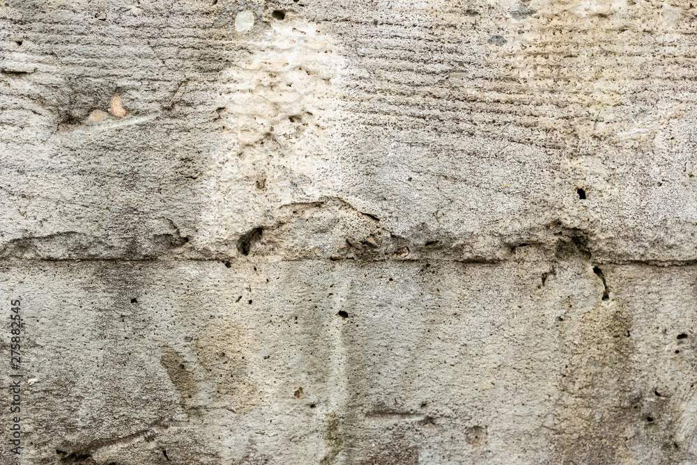 Texture, wall, concrete, it can be used as a background. Wall fragment with scratches and cracks Texture, wall, concrete, it can be used as a background. Wall fragment with scratches and cracks