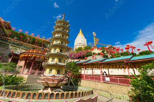 Yellow roof of Kek Lok Si Temple with Penang cityscape in Penang island, Malaysia