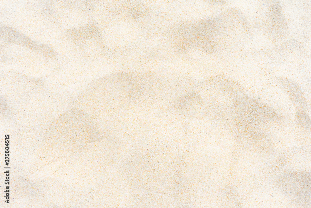 Naklejka premium Fine beach sand texture as background.