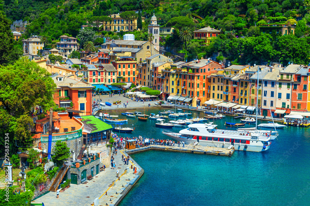 Mediterranean Portofino village with tourists in harbor, Liguria, Italy