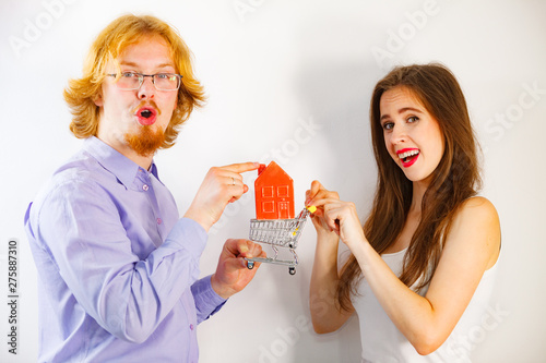 Happy young couple buying real eastate photo