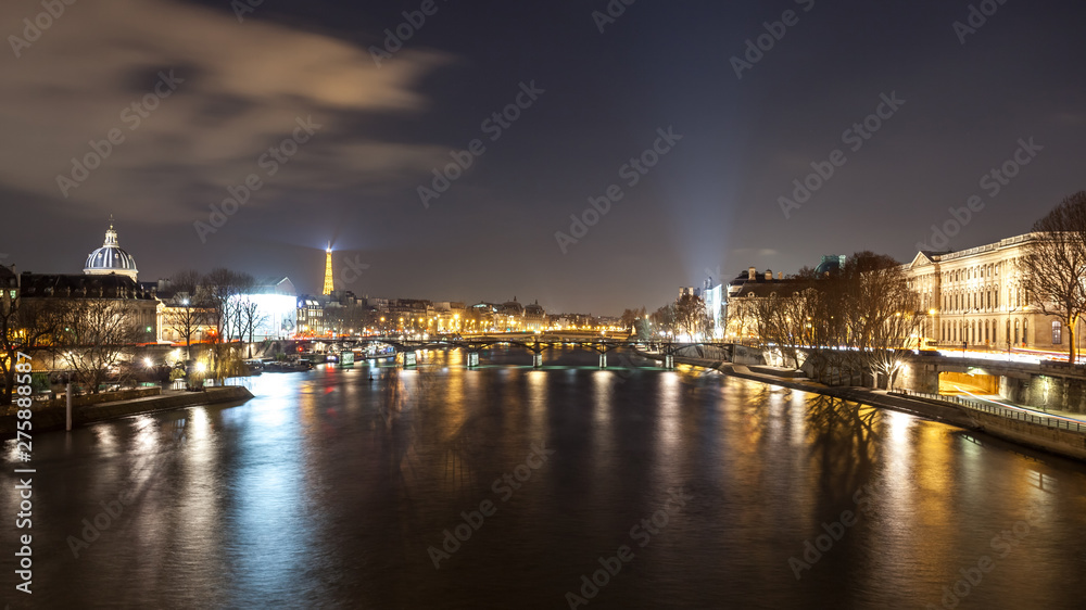 Beautiful view on Seine river in Paris at night. France.
