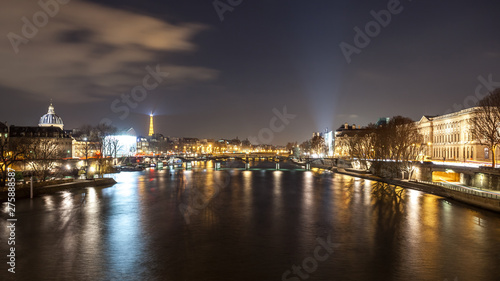 Beautiful view on Seine river in Paris at night. France.
