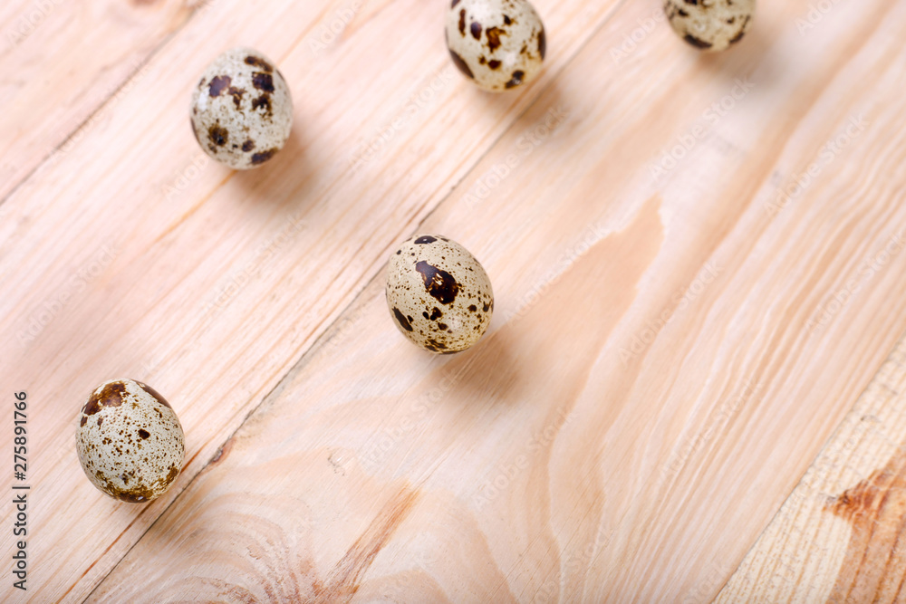 quail eggs on a wooden background quail eggs on a wooden background