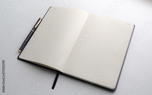 Notebook and an inkpen for business photo