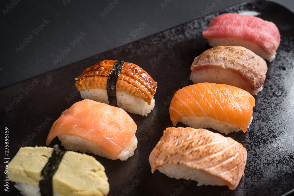 sashimi sushi set on black background sashimi sushi set on black background