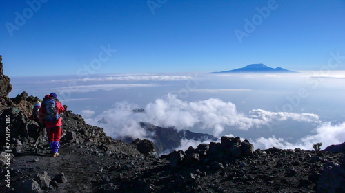 Obraz na plátně climbers hike down from the summit of Mount Meru in Arusha National Park in Tanz