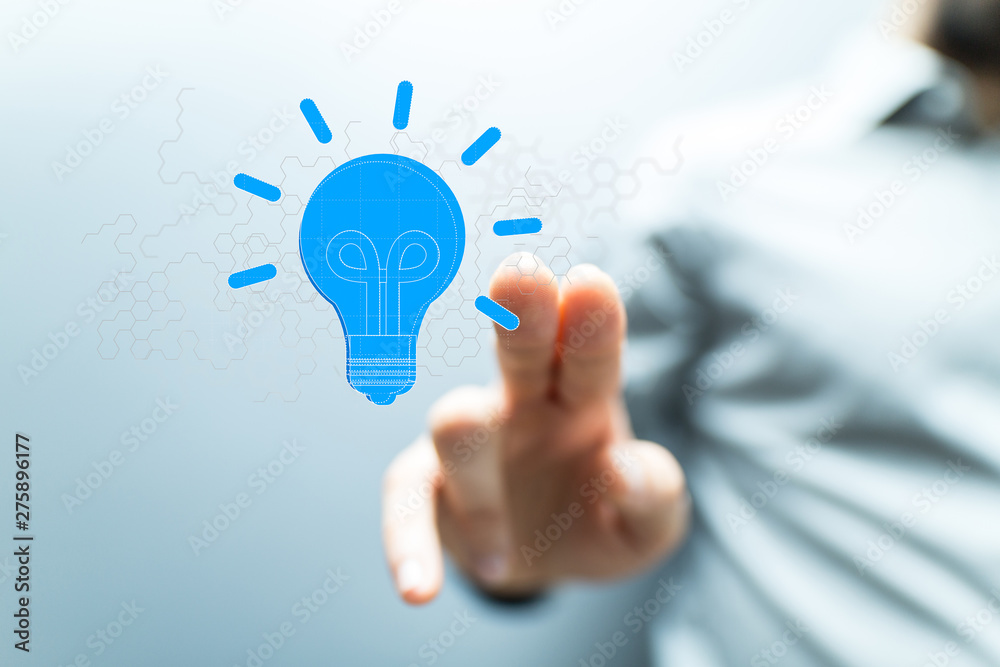  holding illuminated light bulb, idea, innovation and inspiration concept.