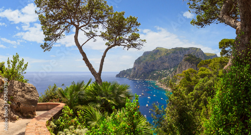 Fototapeta Naklejka Na Ścianę i Meble -  Panoramic view of Marina Piccola and Tyrrhenian sea in Capri island, Italy. Typical panoramic pedestrian path of Capri.