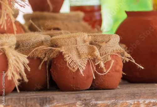 Honey in pottery in the market