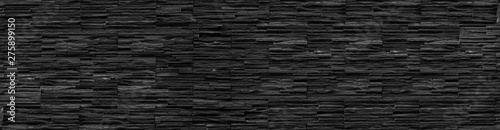 panorama black brick wall of dark stone texture and background