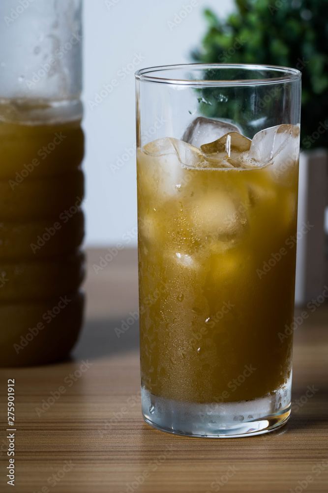 filling an empty ice cold glass with sugar cane filling an empty ice cold glass with sugar cane