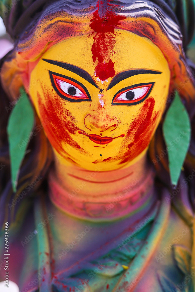 Goddess Durga painted in colorful paint for Durga Puja Festival