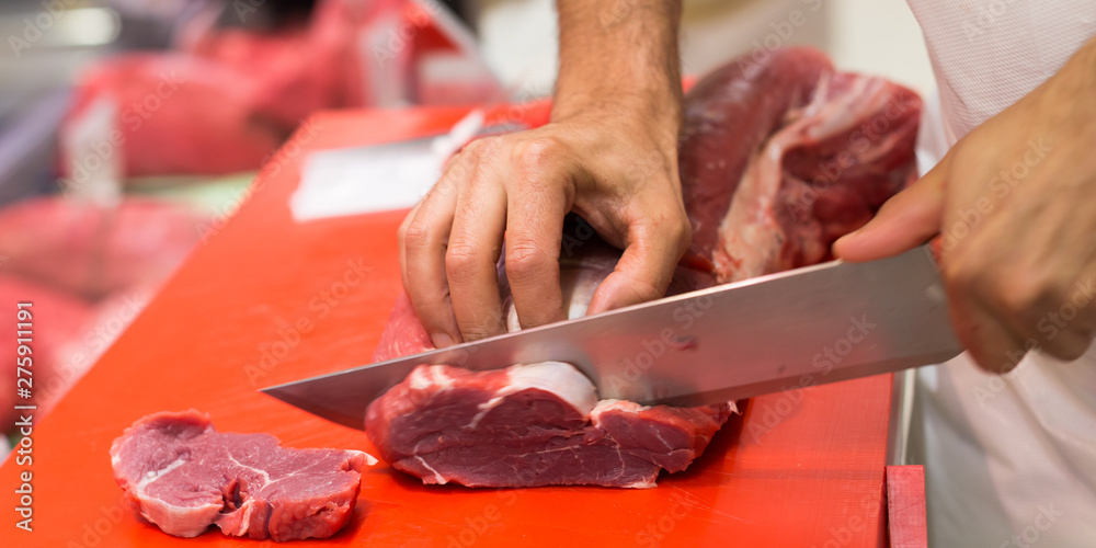 Butcher at work; food an market photography