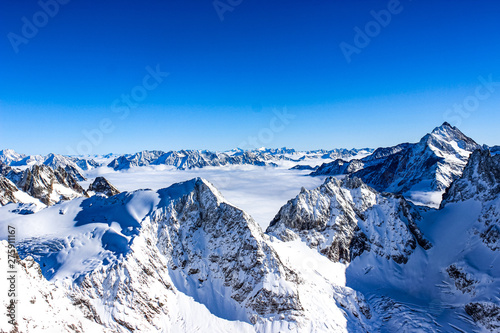 Atop Mt. Titlis in Switzerland. Shot from the highest hanging bridge in Europe © Sujay