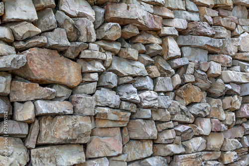 Part of the stone wall in daylight