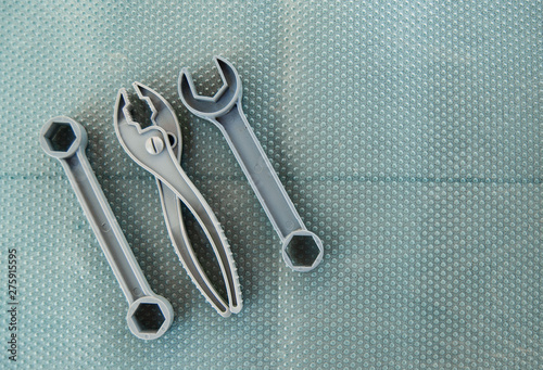 toy instruments tools on a neutral background