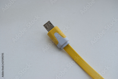 macro yellow and white usb connector wire