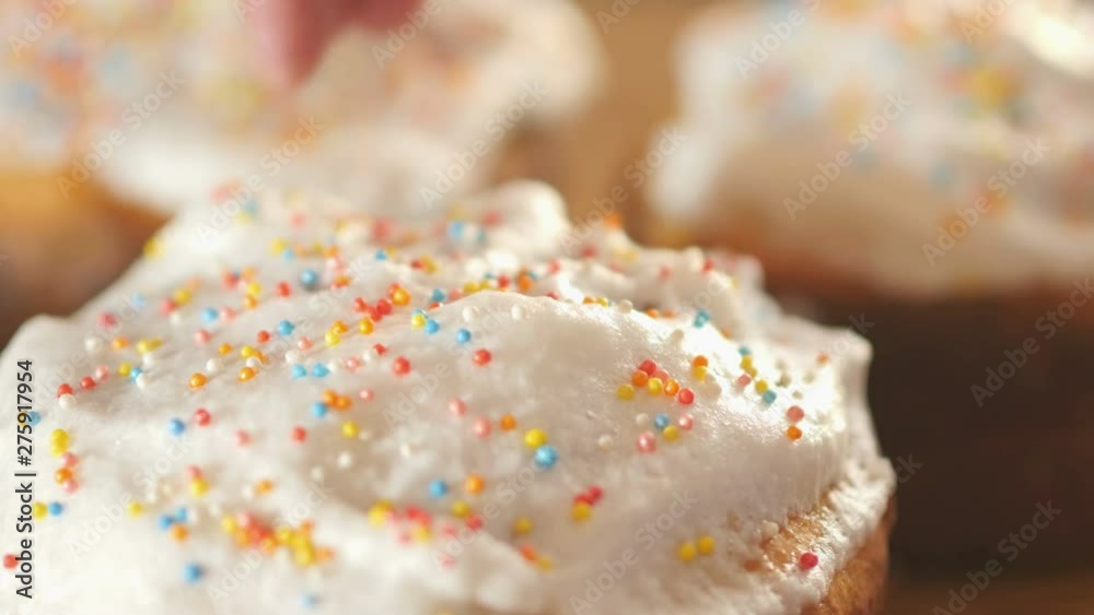 chef hands sprinkle cake confectionery dressing, preparation for a family holiday. close up video. 4K UHD chef hands sprinkle cake confectionery dressing, preparation for a family holiday. close up video. 4K UHD