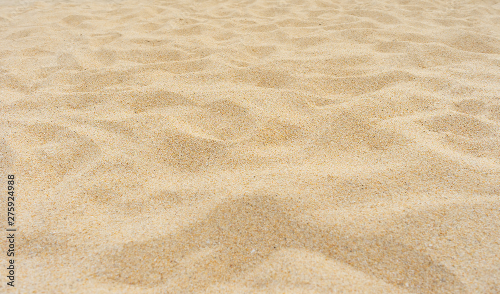Yellow beach sand texture as background. Yellow beach sand texture as background.