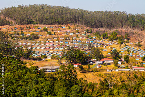 Panoramic view of typical village with colorful houses arranged in geometric manner, Swaziland, South Africa