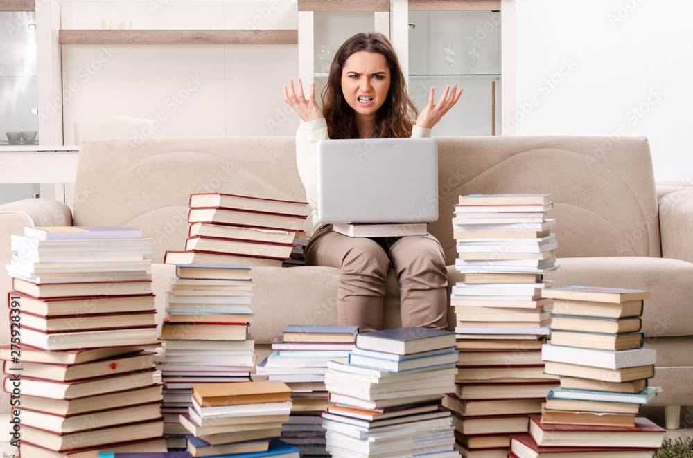 Young female student preparing for exams at home Young female student preparing for exams at home