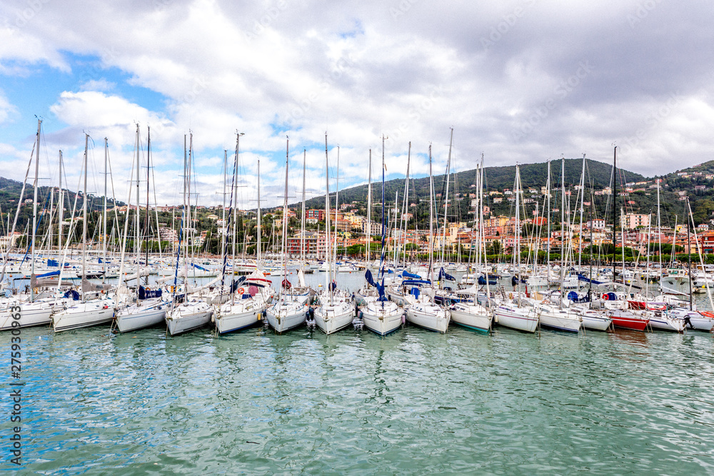 Sailboats and houses on the hills of Lerici, Italy