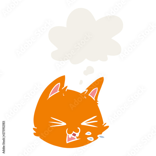 spitting cartoon cat face and thought bubble in retro style