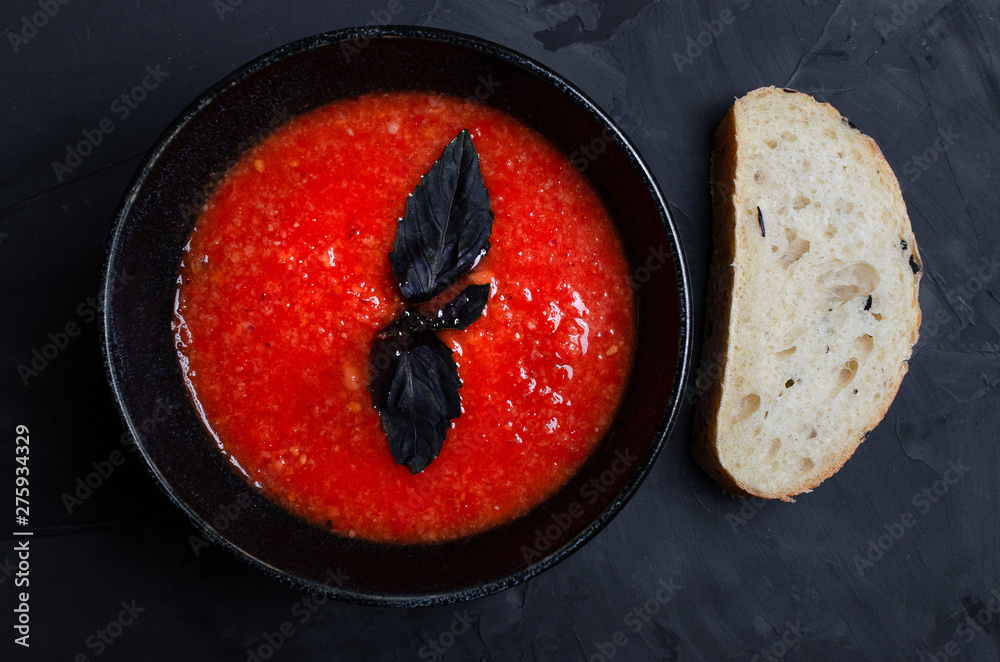 Vegetable soup, cherry tomatoes, and slices of bread Vegetable soup, cherry tomatoes, and slices of bread