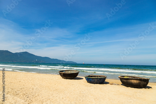 Basket boats on My Khe beach in Danang. Traditional Vietnamese small fishing boats on My Khe Beach in Danang, Vietnam.