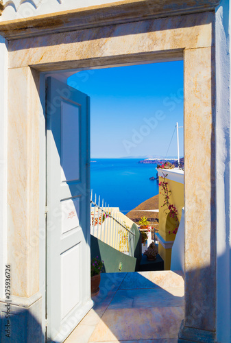door open with sea view, from a courtyard in Santorini, Greece © vladimircaribb