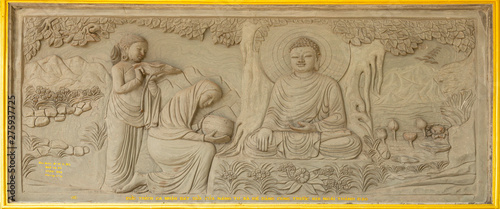 Carved Picture on the temple wall in Danang