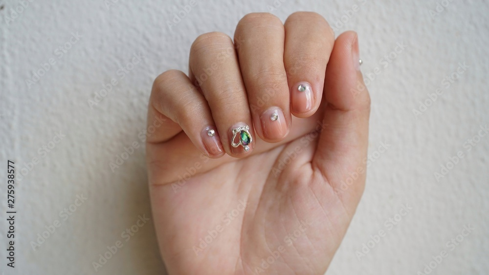 hand with manicure on white background